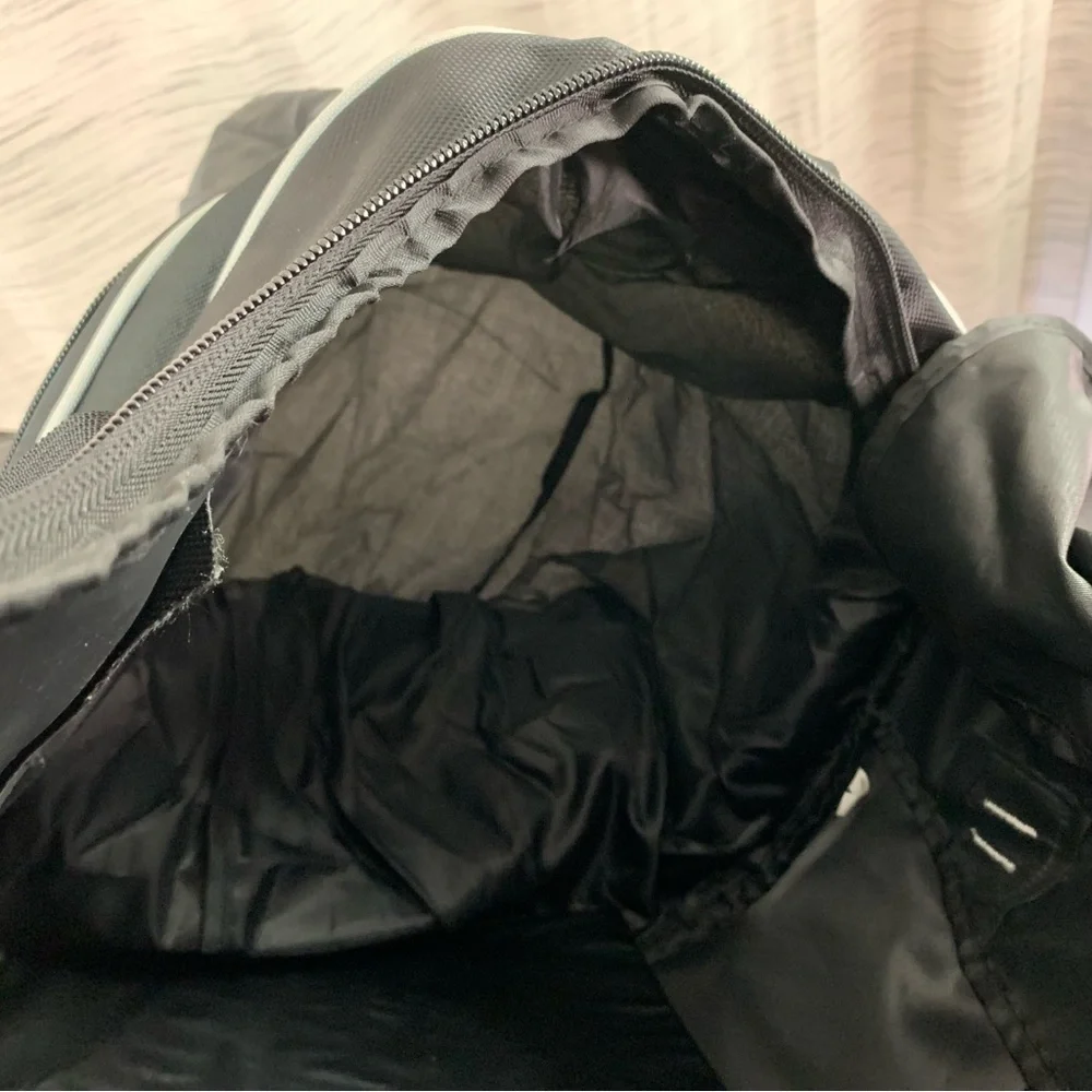 A Black 100th Anniversary Duffel Bag (Masonic?).